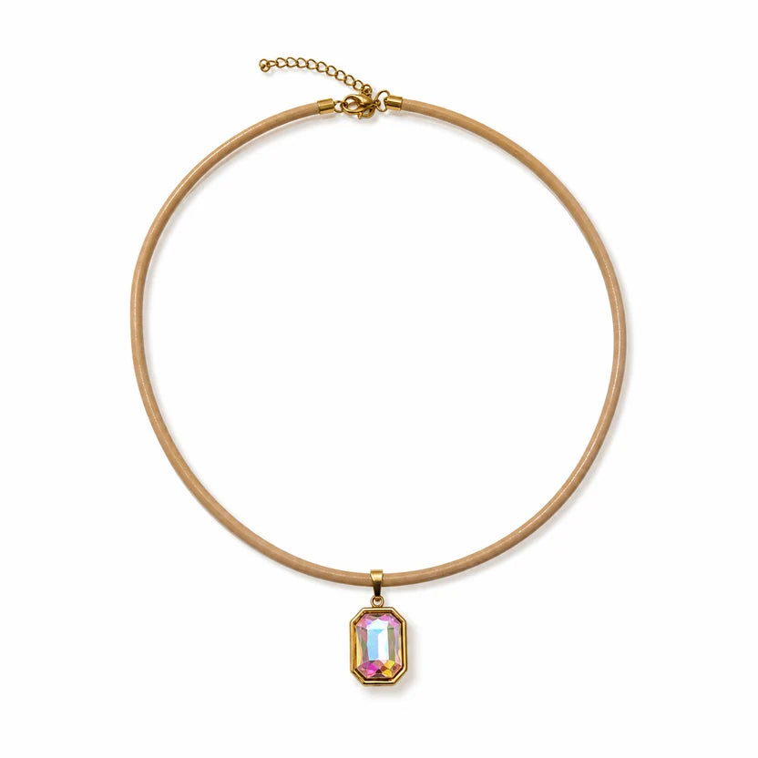 Quin Pendant Necklace in tan cord with iridescent pendant on a white background