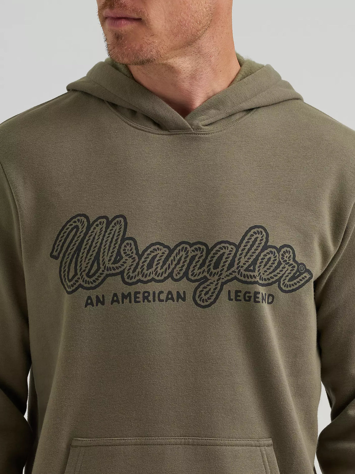 Wrangler Legacy script hoodie in olive, close-up of An American Legend script logo