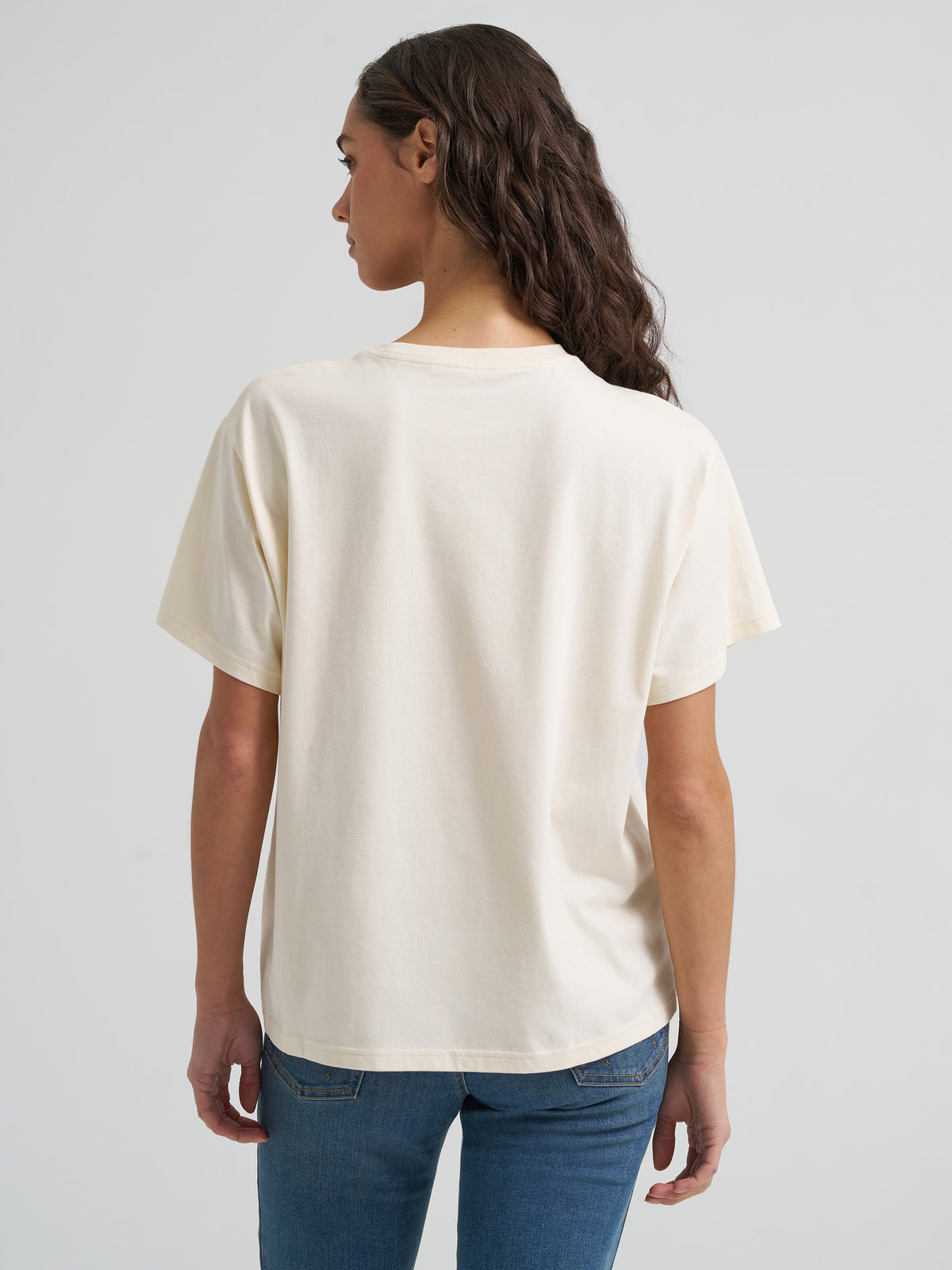 Wrangler Women's Retro Western Graphic Tee in antique white, back view on model