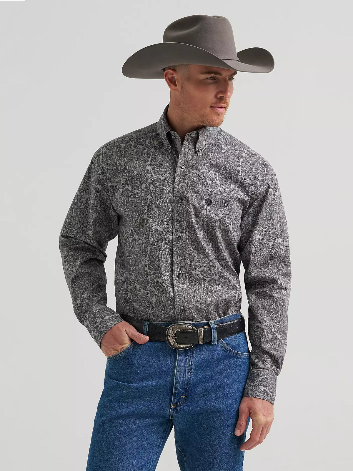 Wrangler George Strait button-down shirt in heritage ash paisley, front on model in cowboy hat