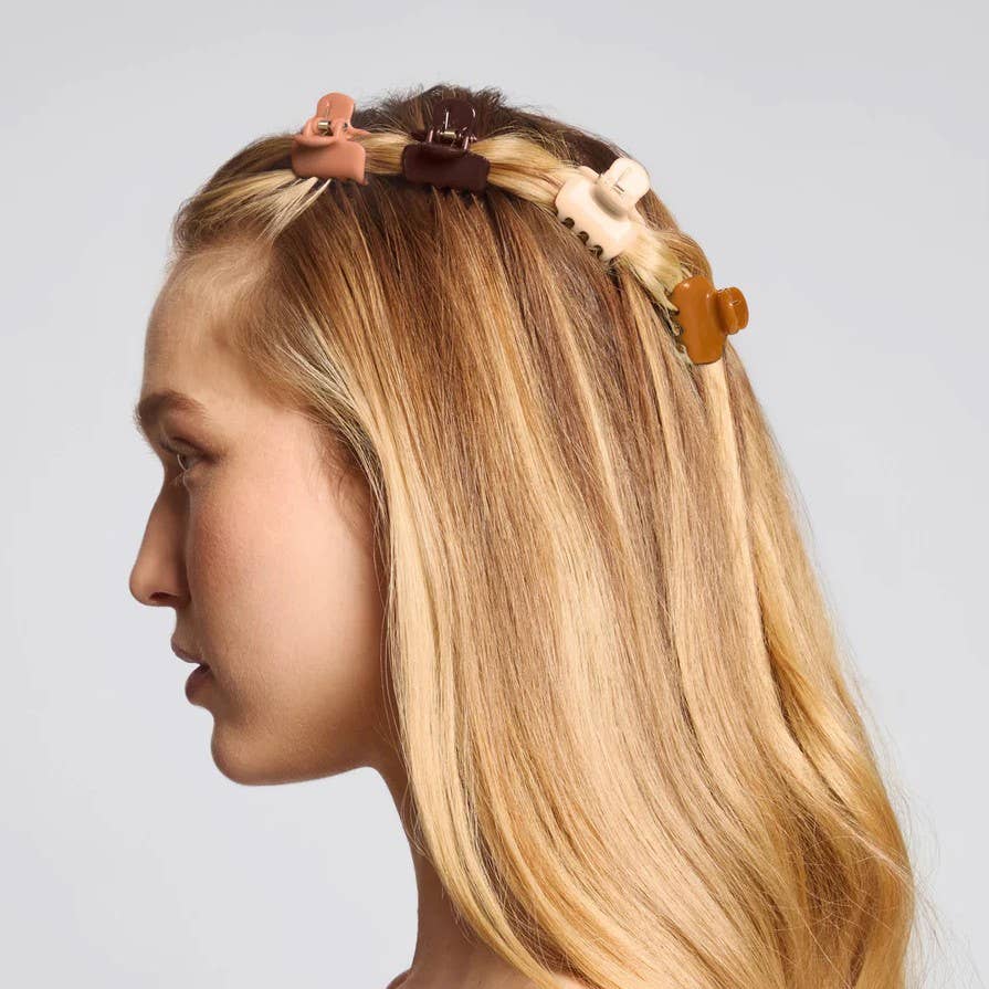 Kitsch Sedona mini cloud clips worn across the top of long blonde hair, side profile