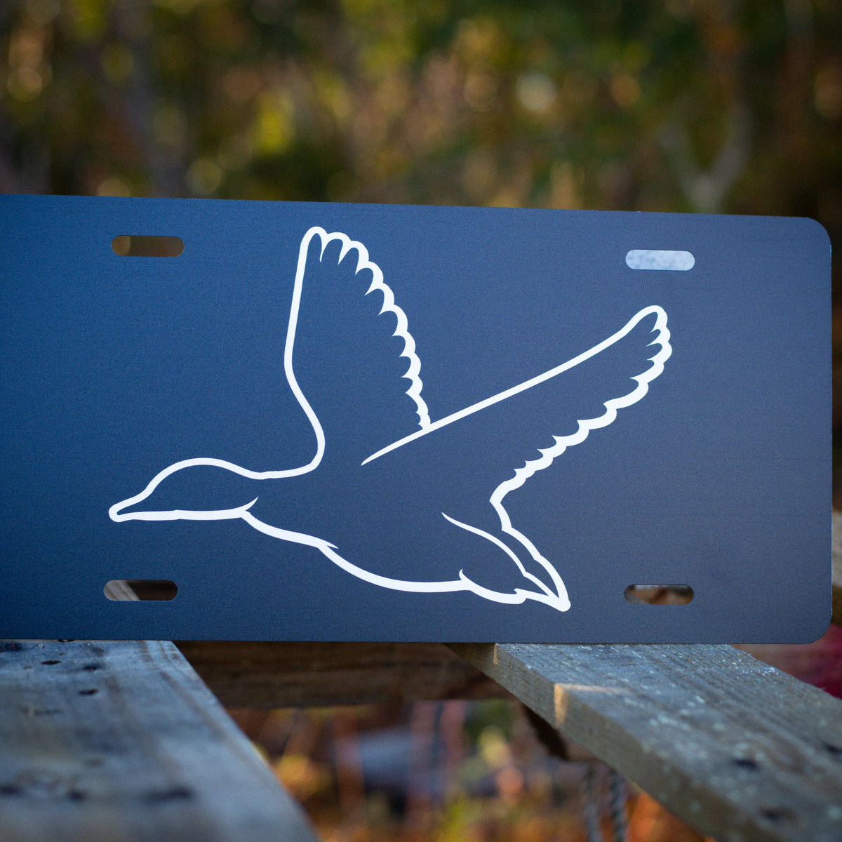 Decorative license plates in camo turkey, farm, and patriotic novelty designs