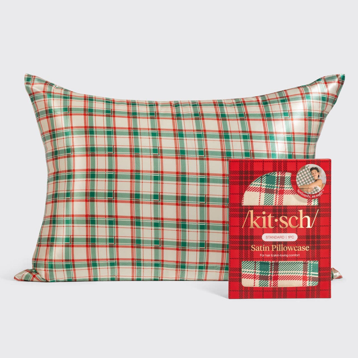 Kitsch standard satin pillowcase in red and green holiday plaid, shown with packaging