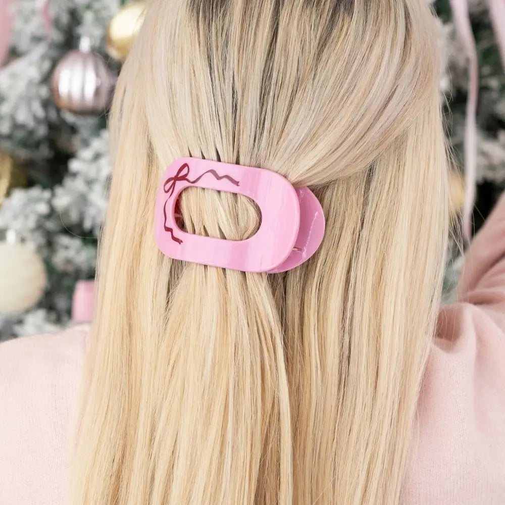 Teleties Just Add A Bow Medium Flat Round Hair Clip in pink worn in blonde half-up hair
