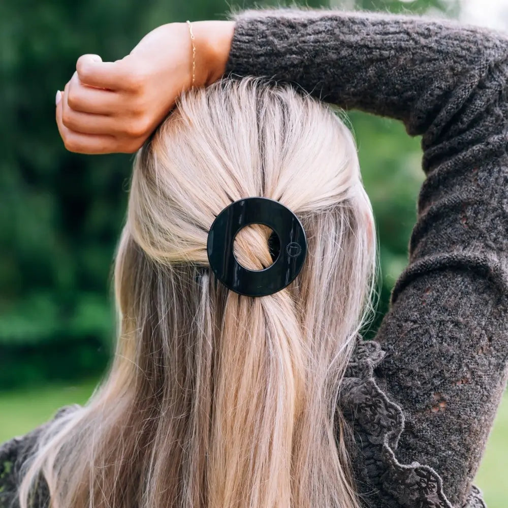 Teleties Jet Black Small Flat Circle Hair Clip worn in blonde half-up hair