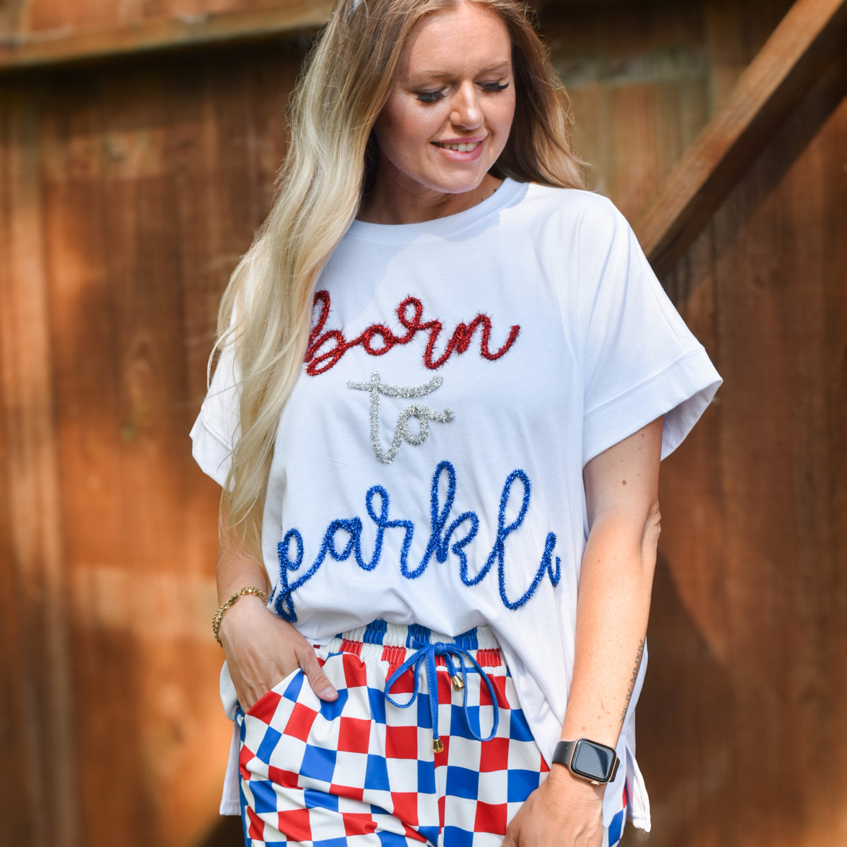 Sparkle graphic Fourth of July top, shown in one of three available colors