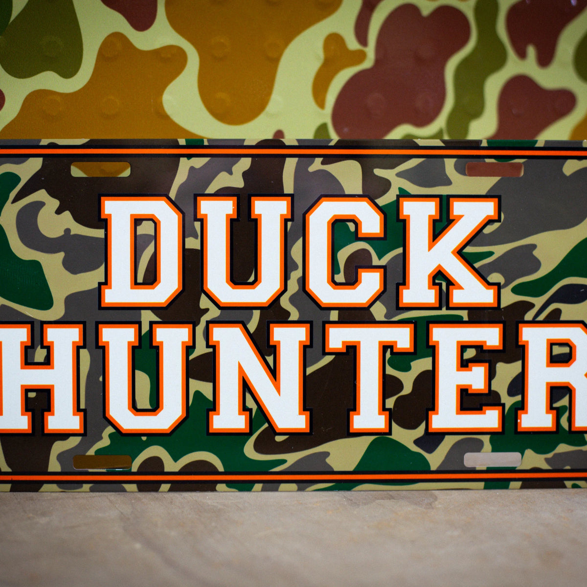 Decorative license plates in camo turkey, farm, and patriotic novelty designs