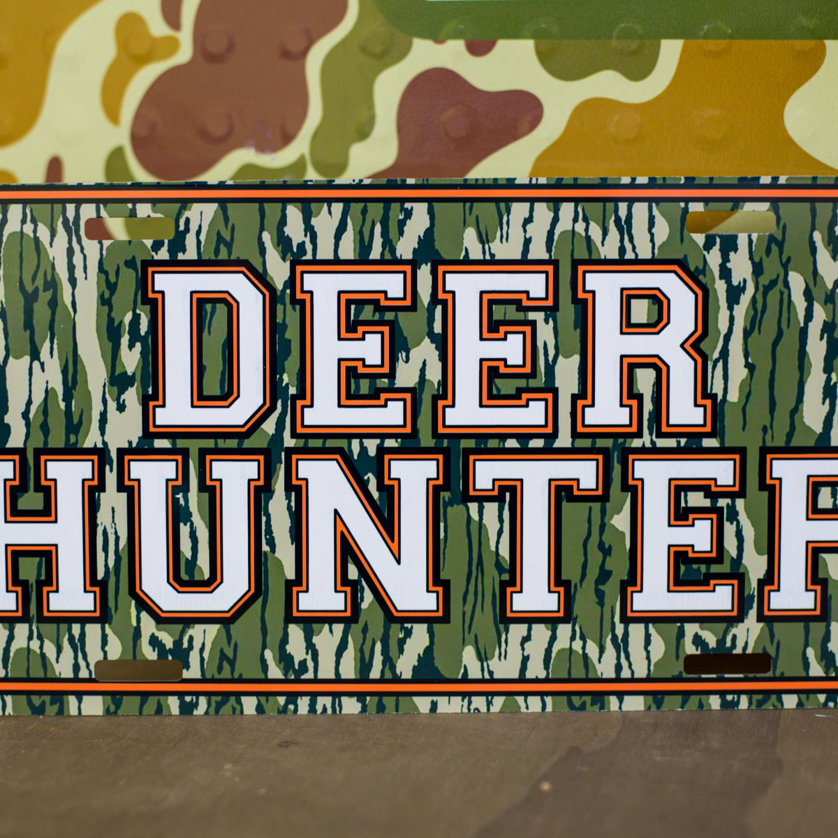 Decorative license plates in camo turkey, farm, and patriotic novelty designs
