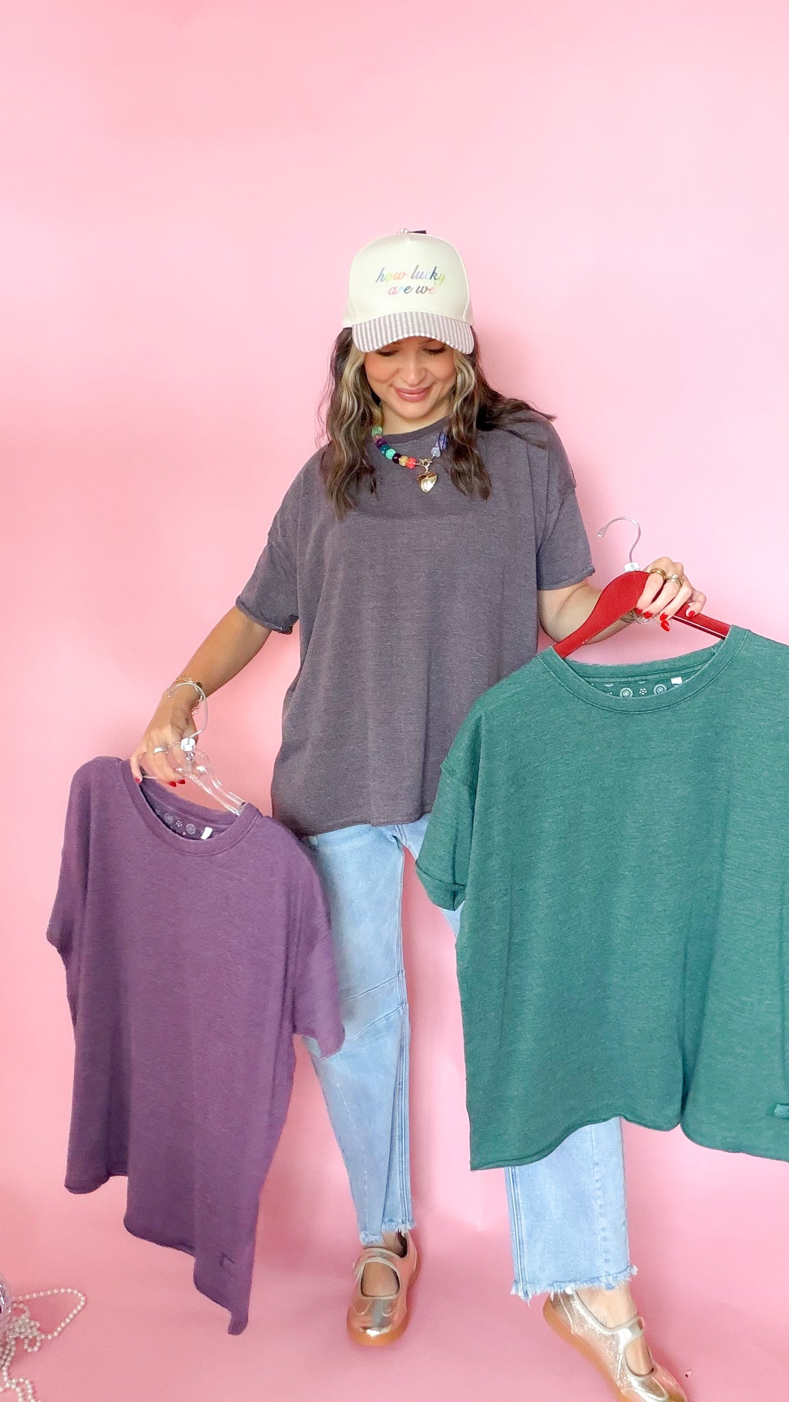 Purple and green raw edge vintage tees shown together