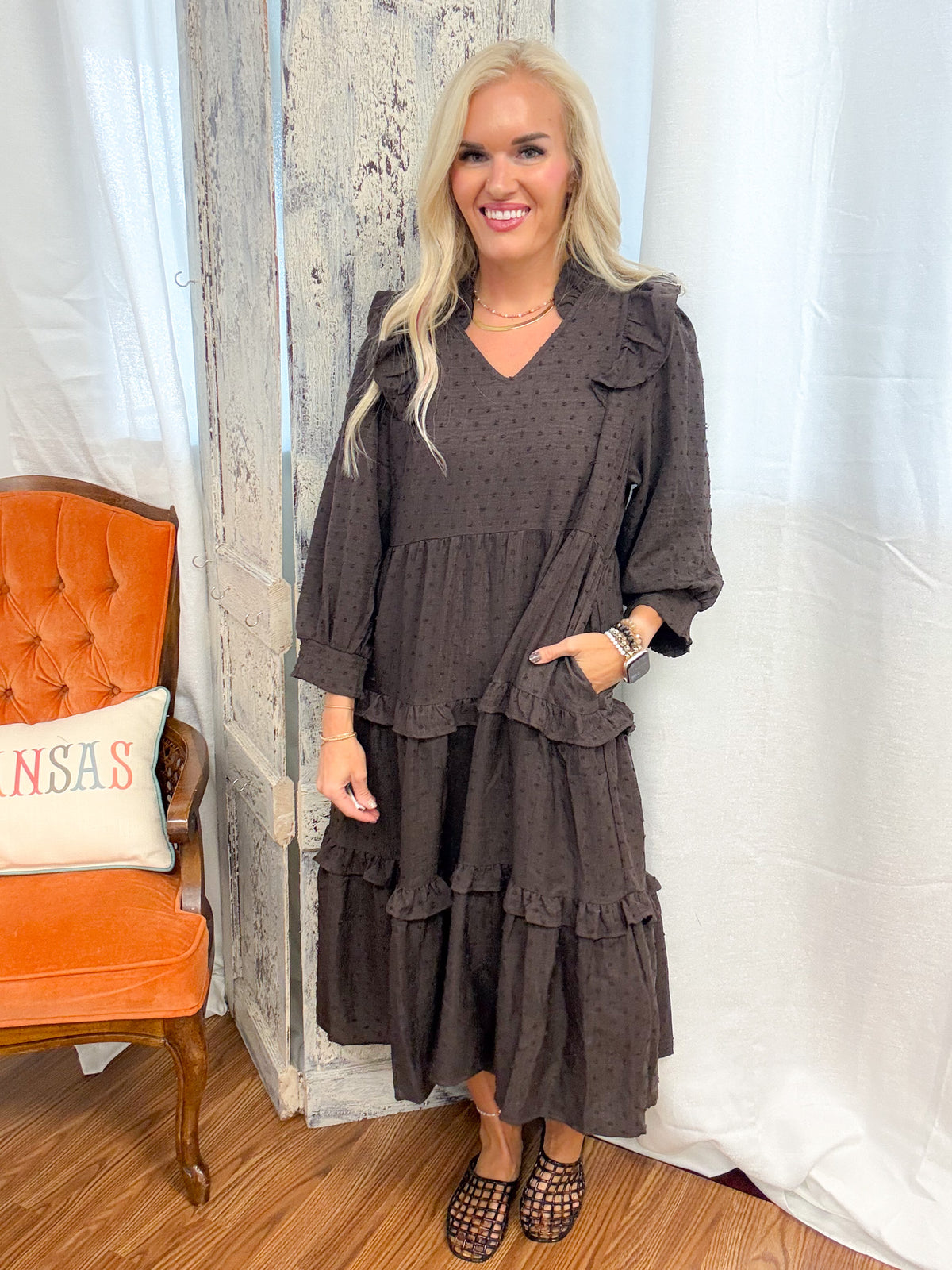 jenna pictured wearing the women's brown tiered midi dress