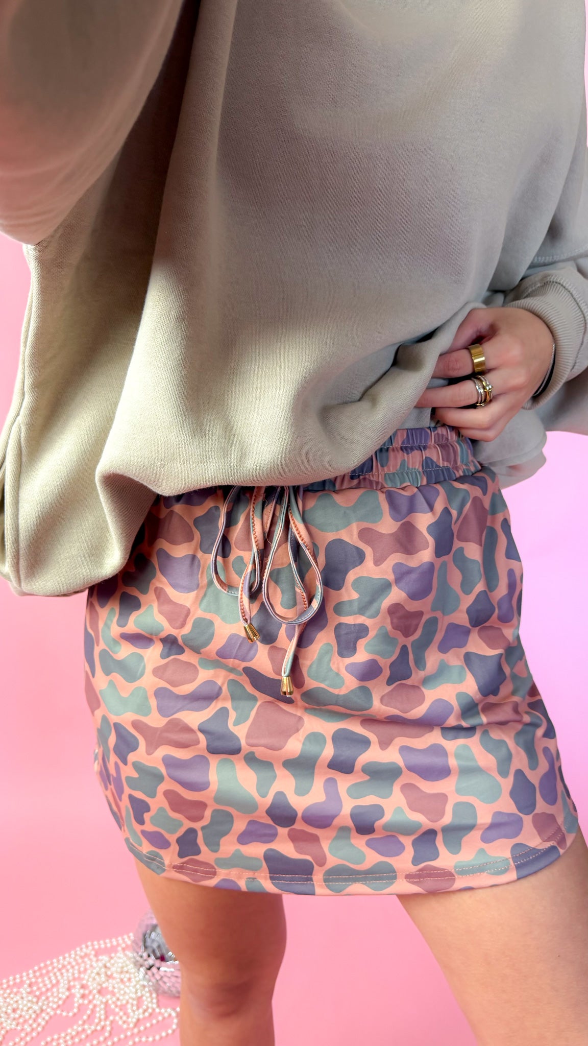 Women’s Birdie Cedar Marsh duck camo active skort with built-in biker shorts.