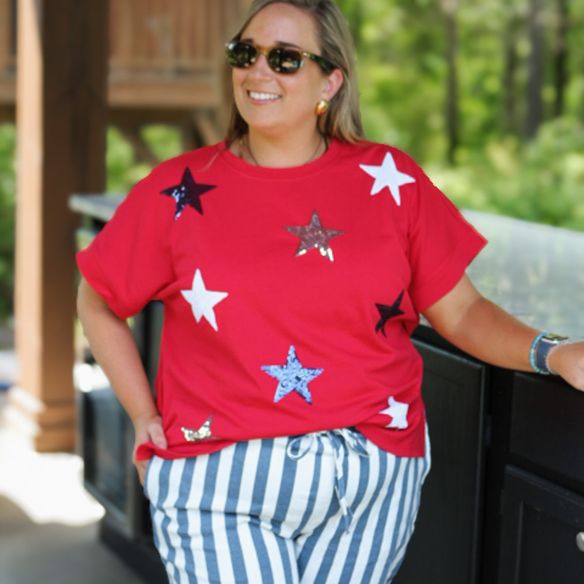 Sparkle graphic Fourth of July top, shown in one of three available colors