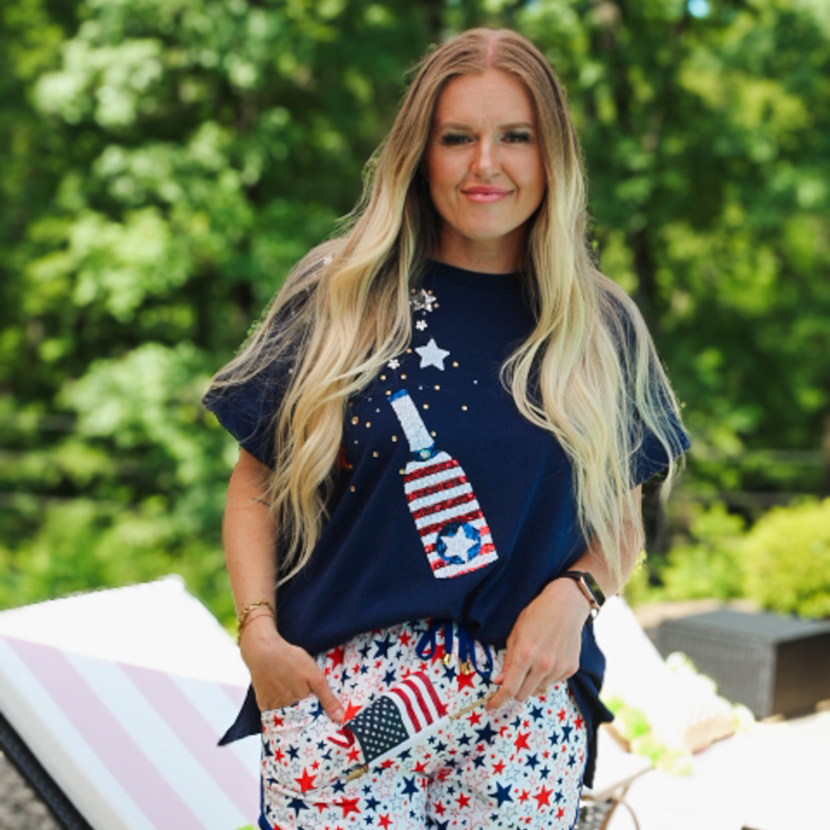 Sparkle graphic Fourth of July top, shown in one of three available colors