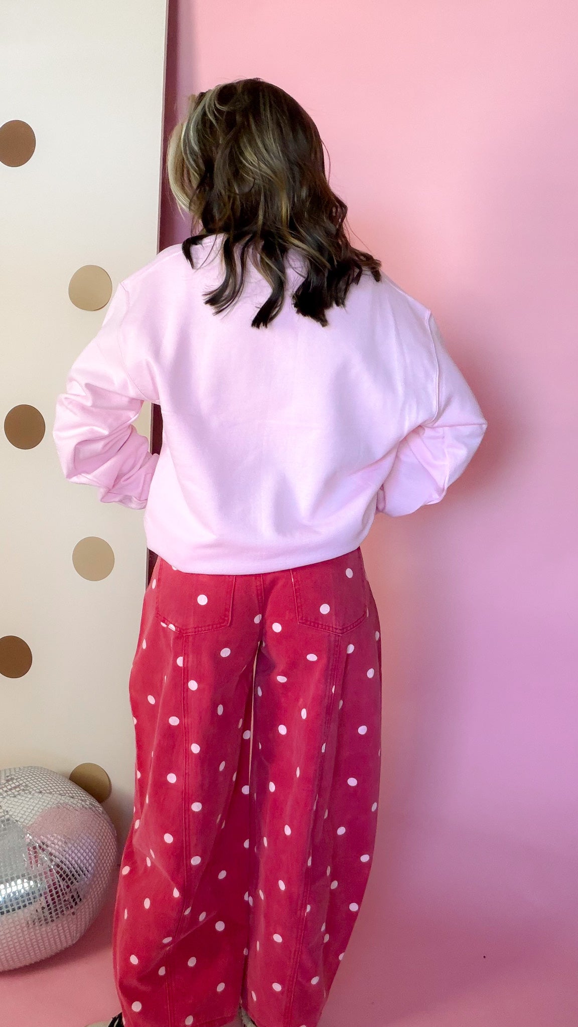 God Is In The Details pink sweatshirt, back view on model