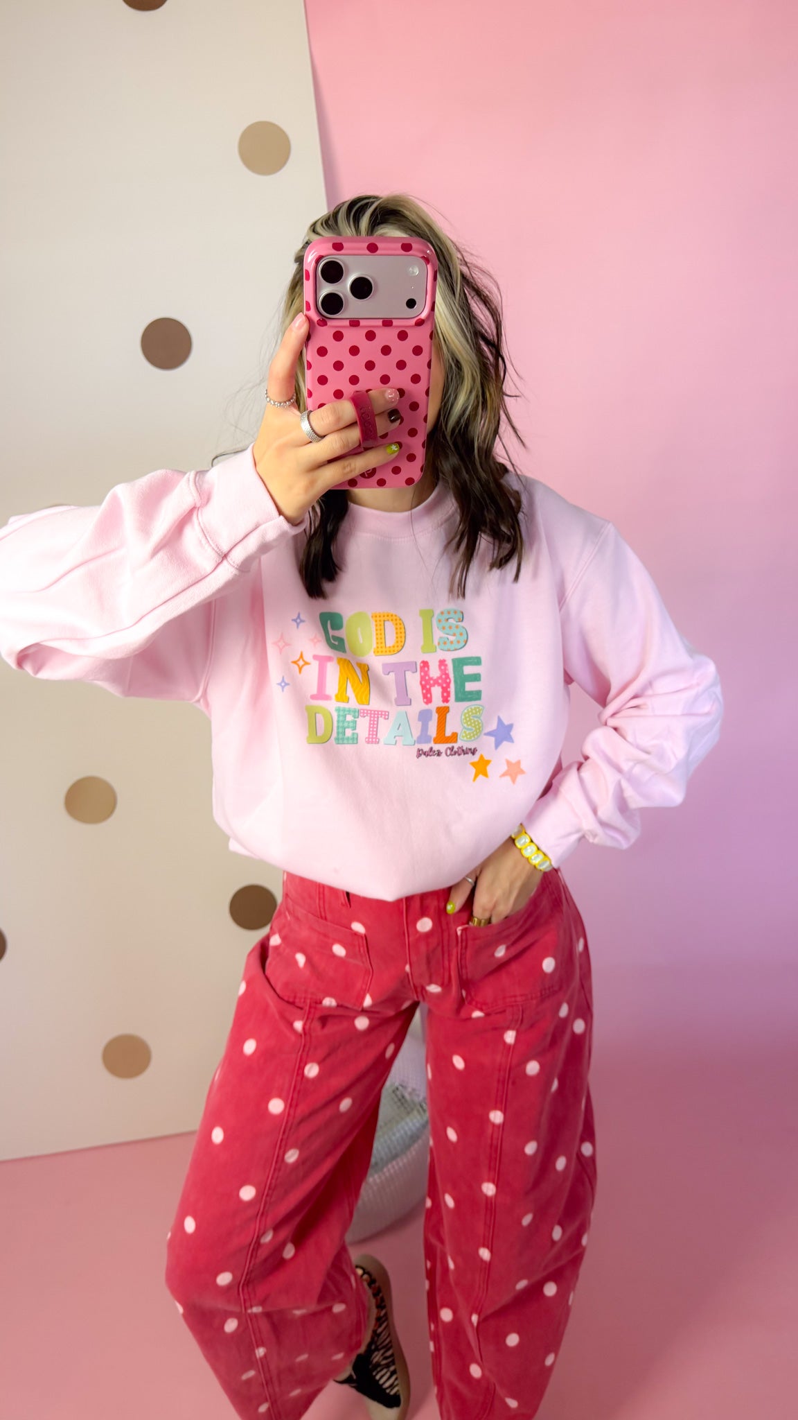 God Is In The Details pink sweatshirt, close-up mirror selfie