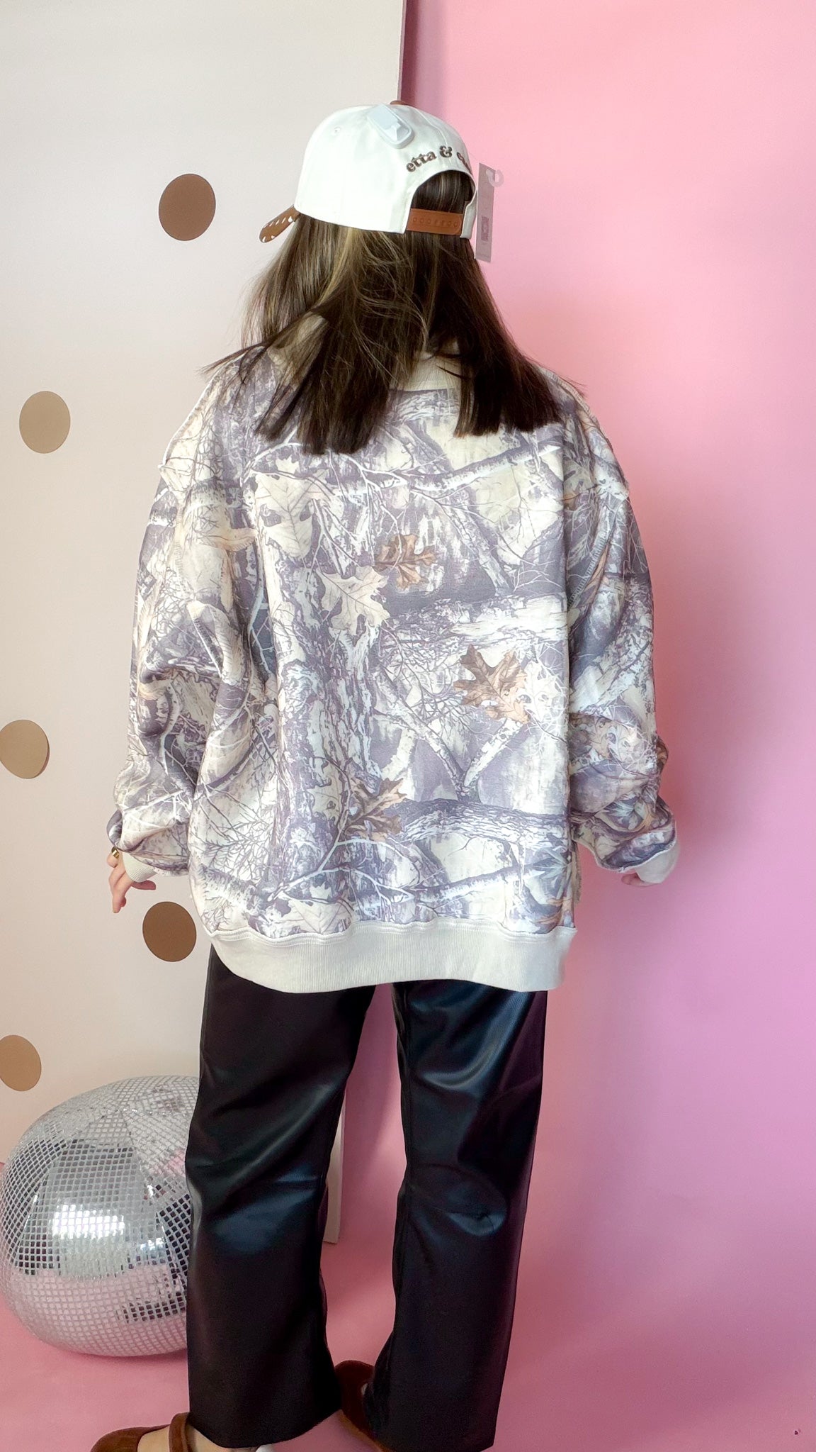 Back view of taupe Real Tree camouflage sweatshirt showing allover woodland print and contrast hem.