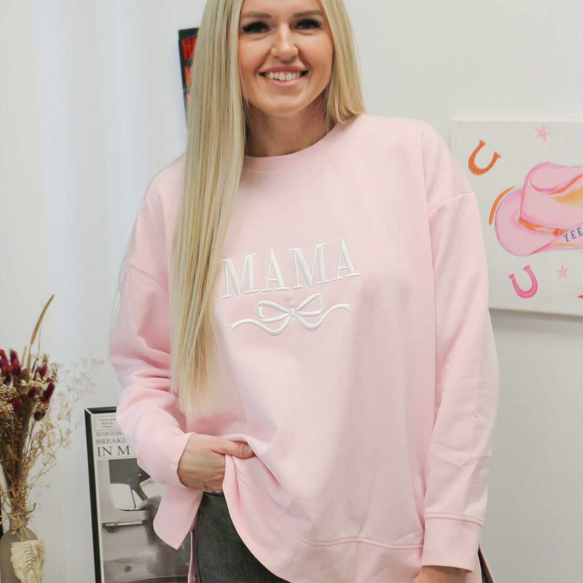 Mama Bow sweatshirt, shown in one of two available colors