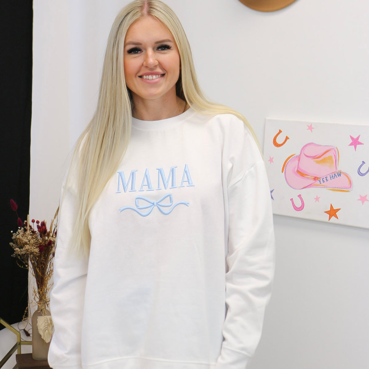Mama Bow sweatshirt, shown in one of two available colors