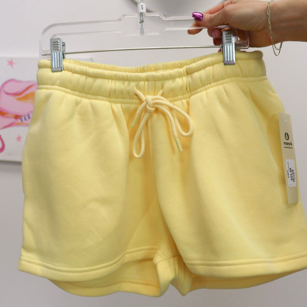 Speak With Confidence sweat shorts, shown in one of two available colors