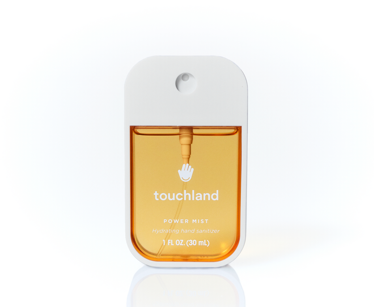 Touchland Spiced Pumpkin-Tini Power Mist Hand Sanitizer, orange 1 oz spray bottle, front view