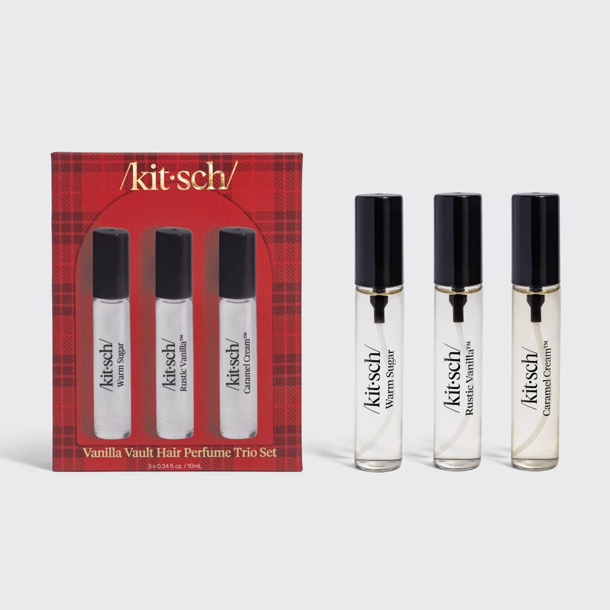 Kitsch Vanilla Vault hair perfume trio set, three spray vials shown with red plaid gift box