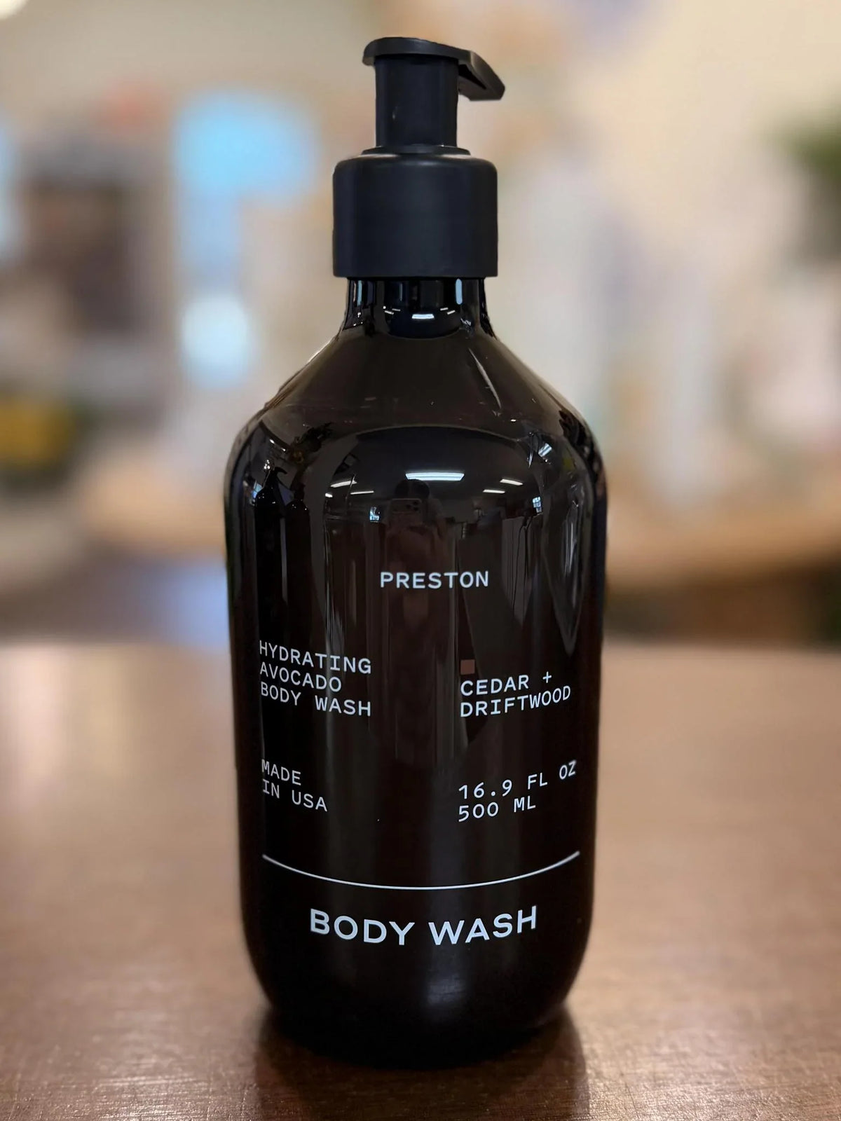 Preston Cedar & Driftwood moisturizing body wash, 16.9 oz black pump bottle front label