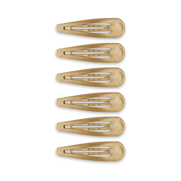 Teleties gold snap clips, six lined up in a row
