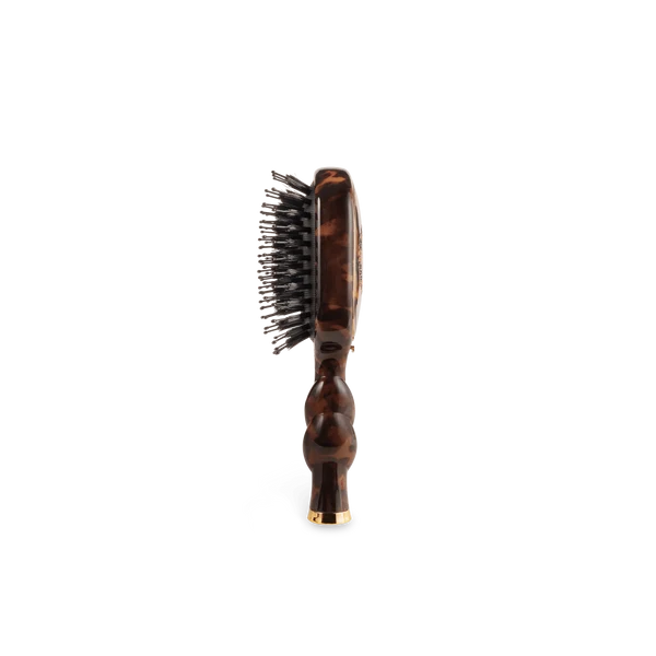 Teleties Mini Boar Brush in tortoise, side view of the bristles and handle