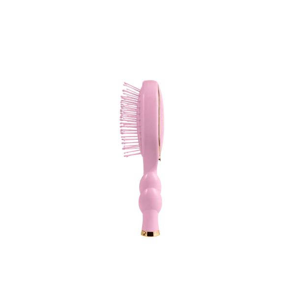 Teleties Mini Detangler Brush in Bubblegum Pink, side view of bristles and handle