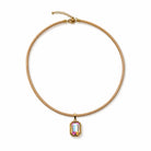 Quin Pendant Necklace in tan cord with iridescent pendant on a white background