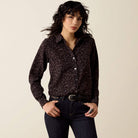 woman wearing Ariat leopard button up blouse