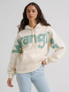 Wrangler Western Logo Hoodie in cream with large green Wrangler logo, front view on a model