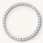 Silver-tone elastic tennis bracelet with a continuous row of clear round stones, viewed from above.