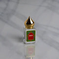 5mL rollerball perfume oil bottle, shown in one of two available scents