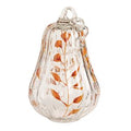 Painted glass pumpkin sitter, shown in one of two available styles