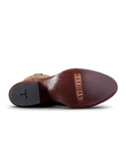 Brown leather shoe sole with 'Tecovas' branding on a white background