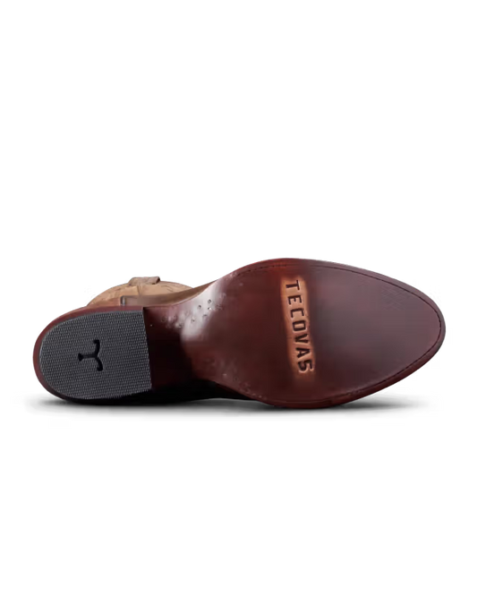 Brown leather shoe sole with 'Tecovas' branding on a white background