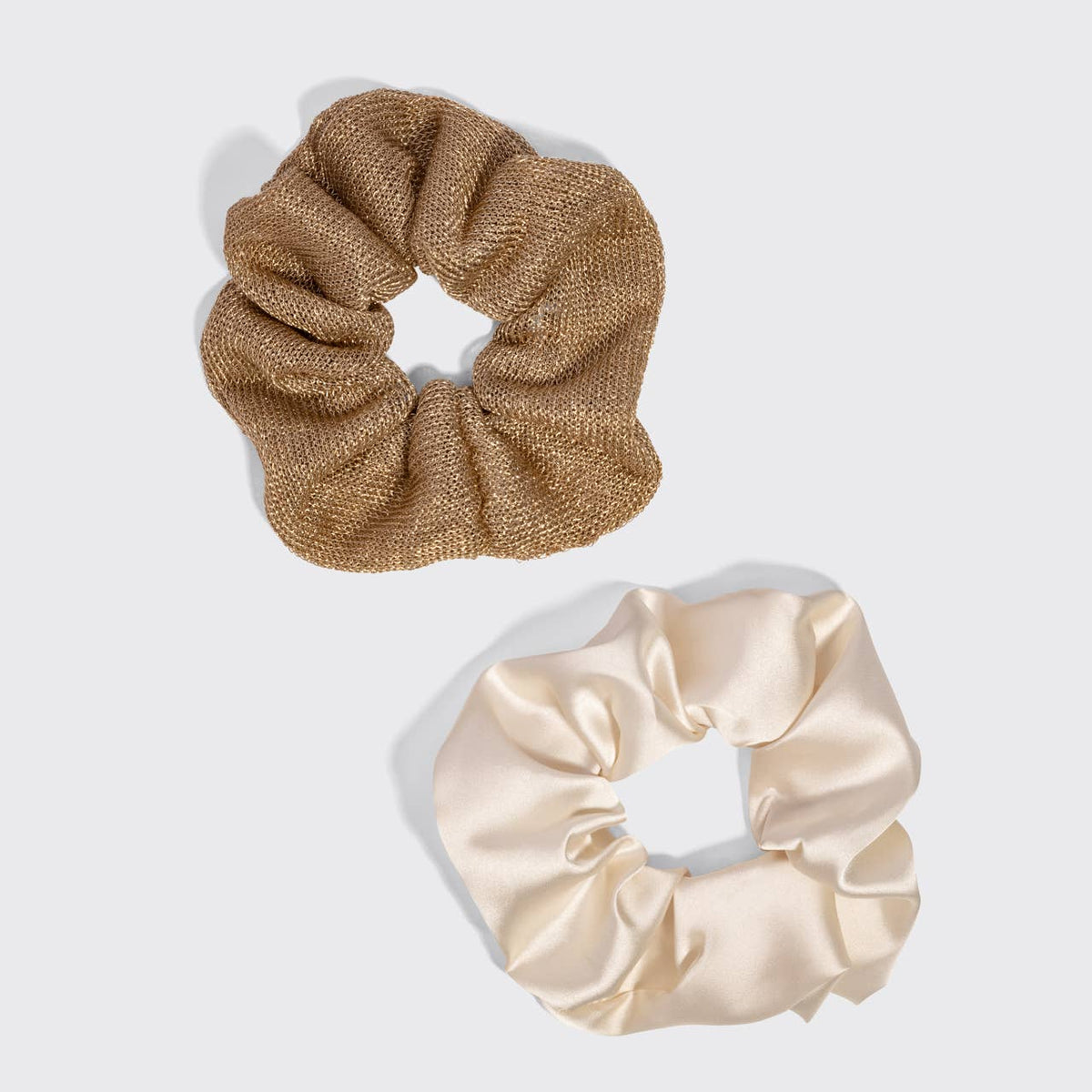 Kitsch gold metallic mesh and cream satin scrunchies laid flat
