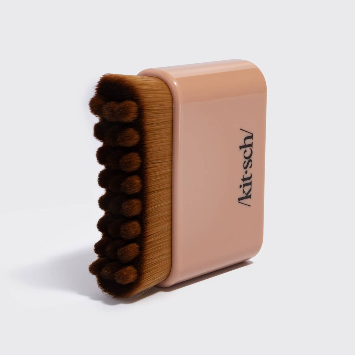Terracotta Kitsch Lymphatic Contour Face Brush, side view of the bristle ridges