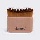 Terracotta Kitsch Lymphatic Contour Face Brush, straight-on front view with logo