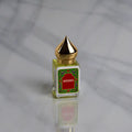 5mL rollerball perfume oil bottle, shown in one of two available scents