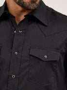 close up of men's black wrangler shirt