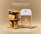 Touchland Midnight S'mores Power Mist beside a stacked s'more, scent label graphic