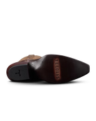 Brown shoe with 'Tecovas' branding on a white background