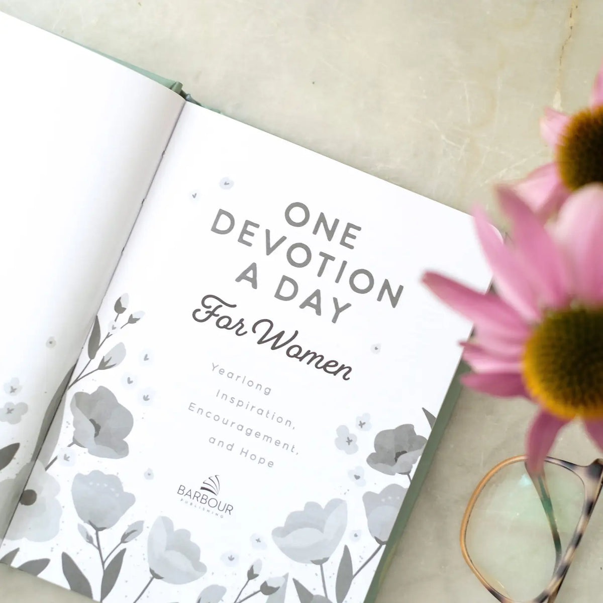 One Devotion a Day for Women, open to grey floral title page