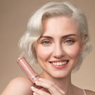 Model with a blonde bob holding a terracotta Kitsch Hair Volumizing Clip