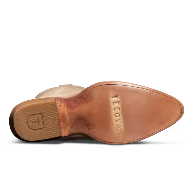 Close-up of a shoe sole with 'Tecovas' branding on a white background