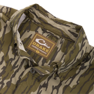Drake 8 Shot Flyweight Bottomland camo shirt, close-up of Drake neck label and collar