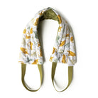 Hot Stuff Heated Neck Wrap in cheetah and palm print, out of the box with olive straps