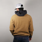 Hooey Men's Cowboy Corduroy Hoodie in brown, back view showing the dark hood and yoke